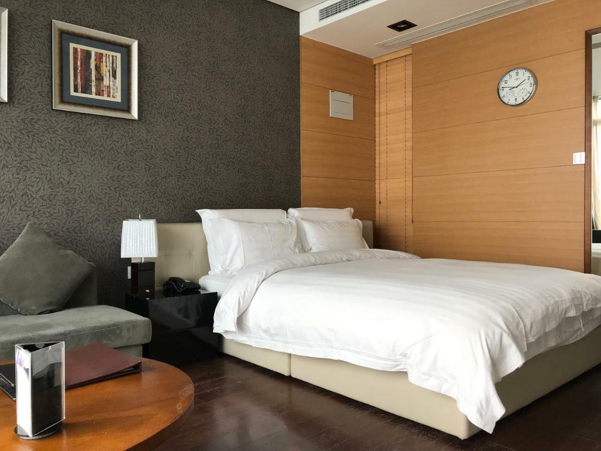 Grand Madison Qingdao Harbour-View Central（Former Qingdao Farglory Hotel） Экстерьер фото